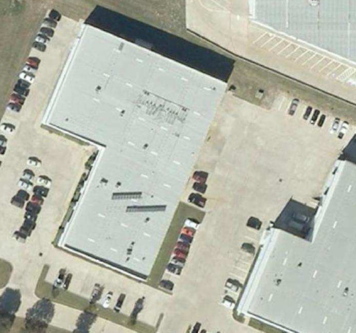 Exeltech facility in Fort Worth - October, 2005 (4 kW PV in racks, 4 kW in dual-axis trackers)
